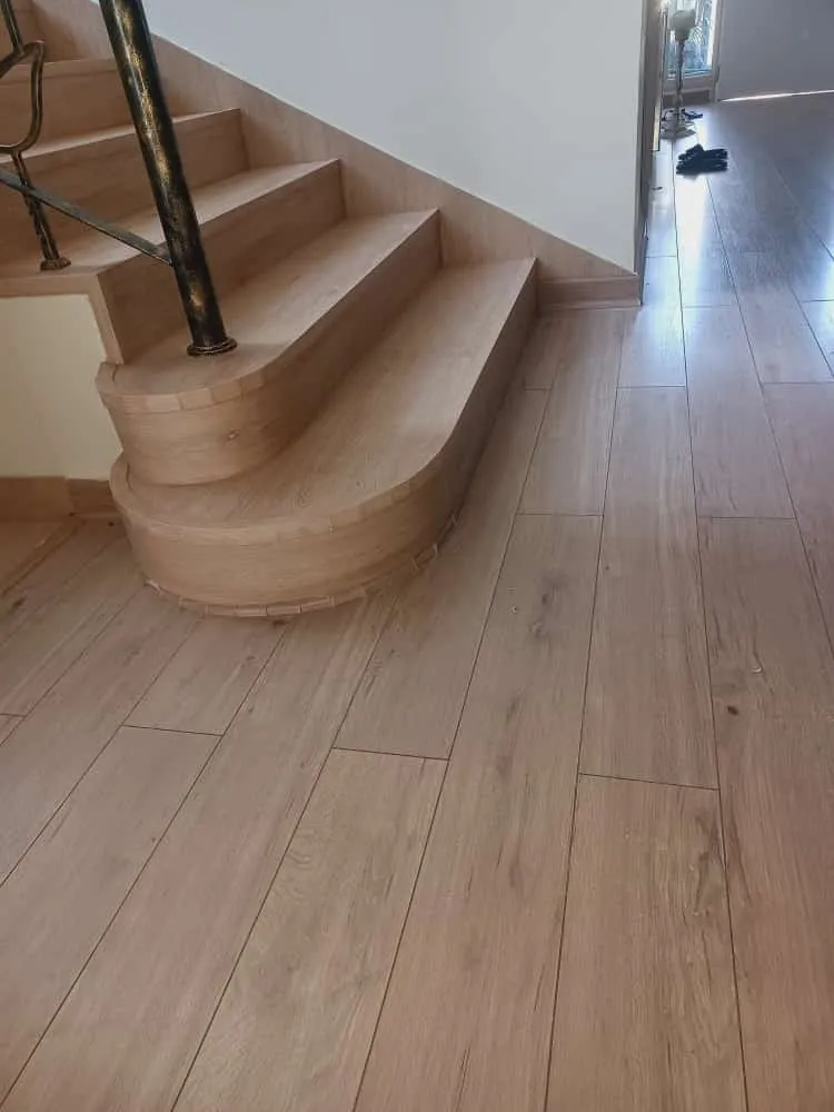 Curved staircase installation, Dubai villa interior fit-out — photo 2