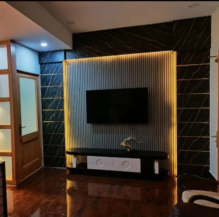Interior fit-out living room feature wall, Dubai villa