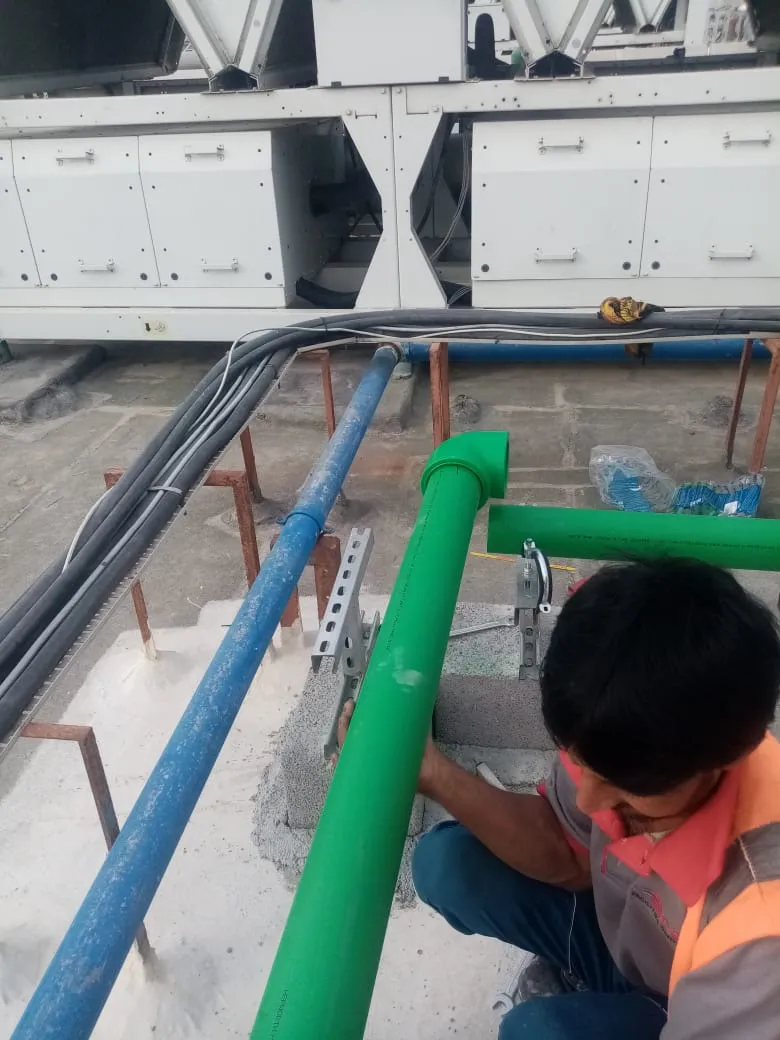 Rooftop piping installation, UAE building — photo 2