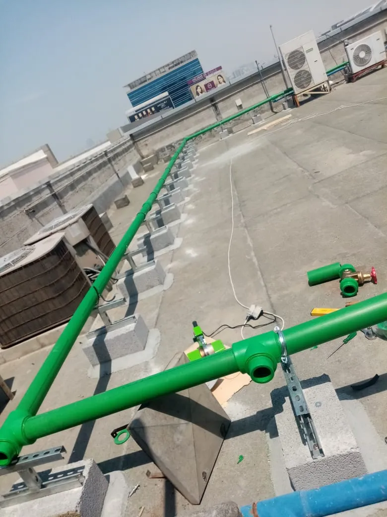 Rooftop piping installation, UAE building — photo 3
