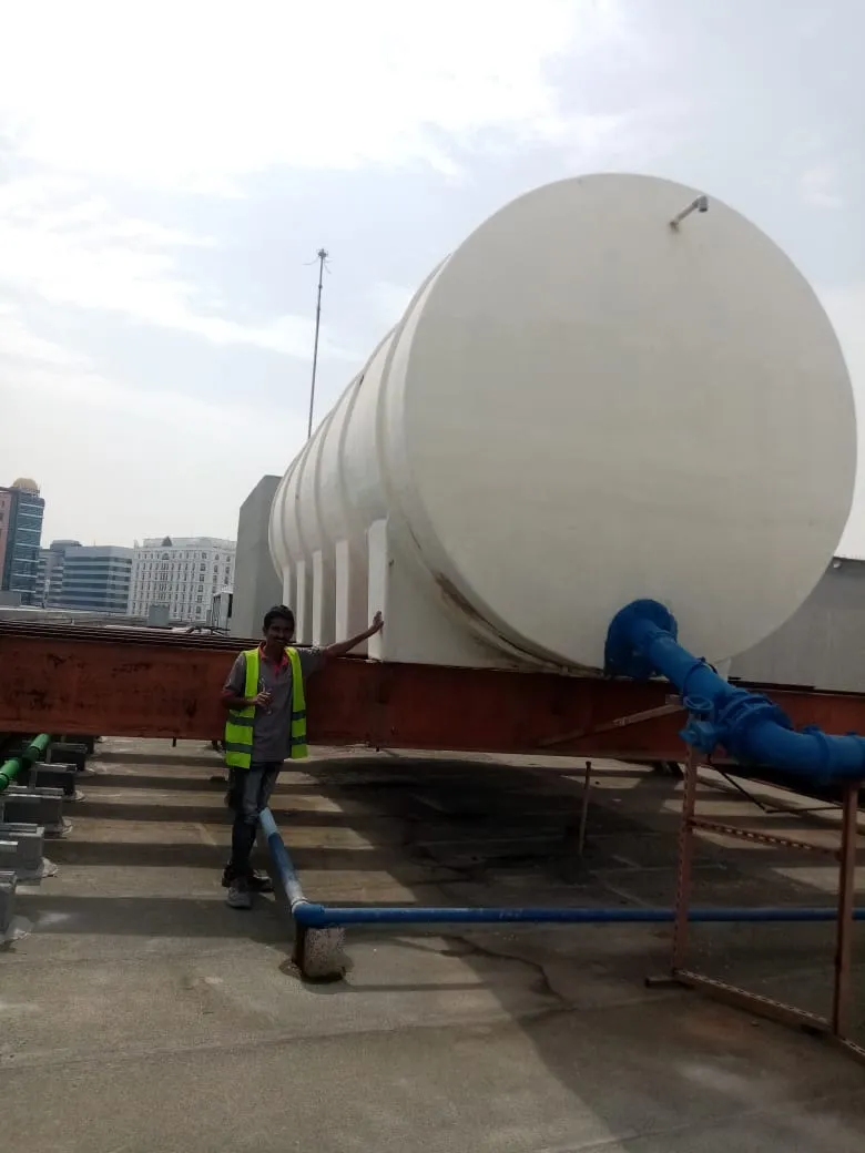 Rooftop water tank installation, UAE building — photo 2