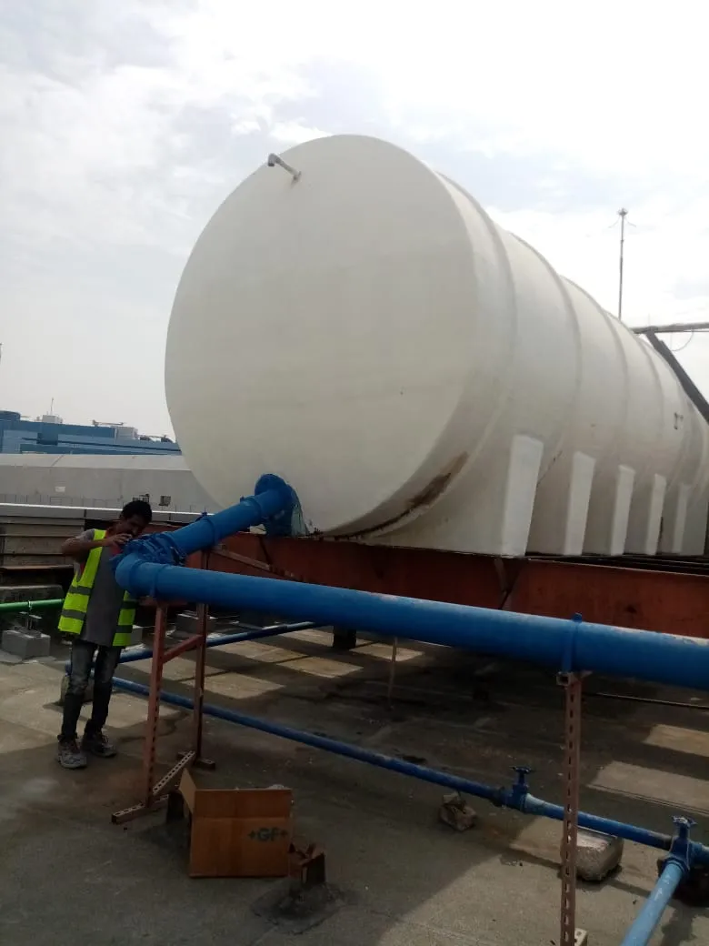 Rooftop water tank installation, UAE building — photo 4