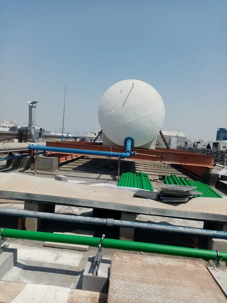 Rooftop water tank installation, UAE building — photo 5