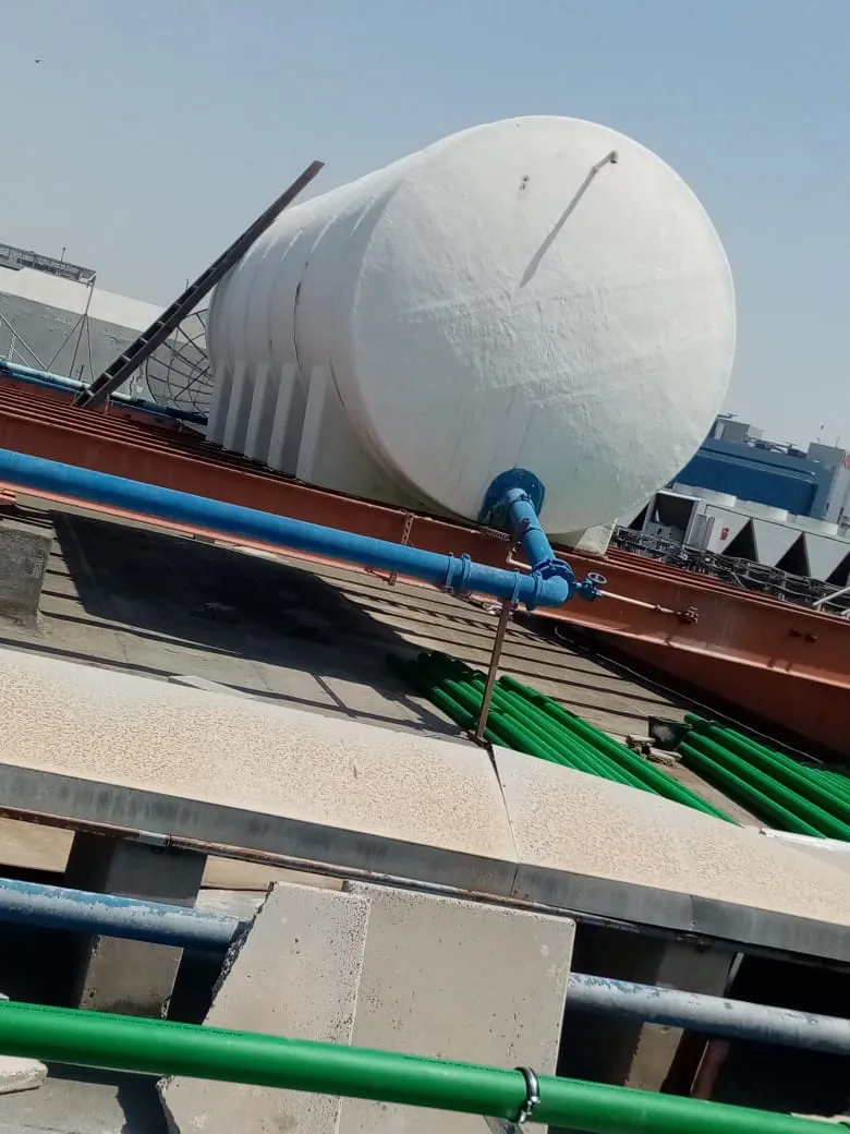 Rooftop water tank installation, UAE building — photo 6