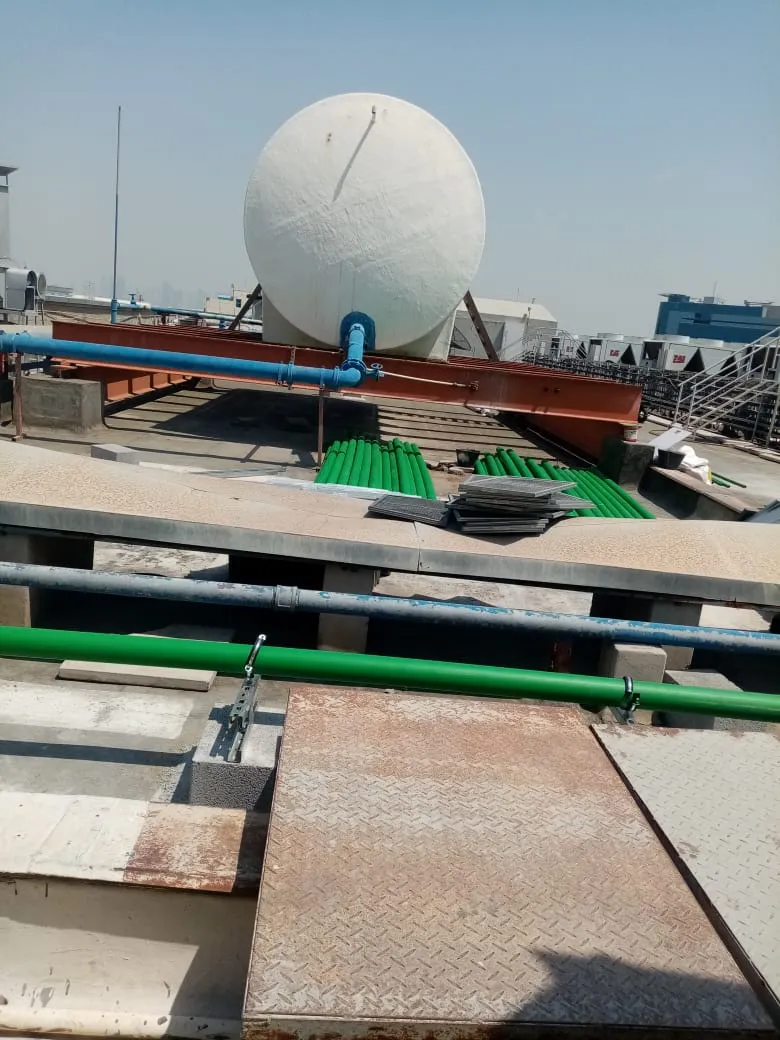 Rooftop water tank installation, UAE building — photo 9