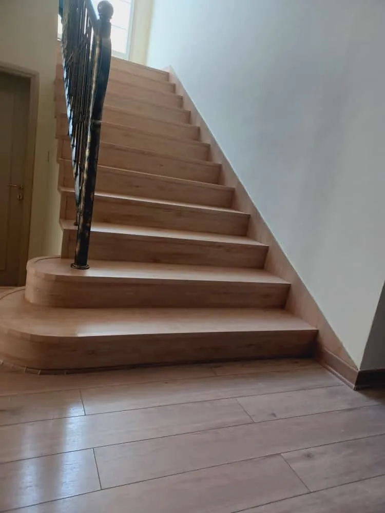Wood staircase installation, Dubai villa interior fit-out — photo 1